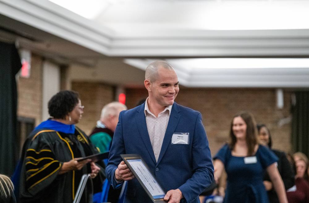 Awardee receiving award 12